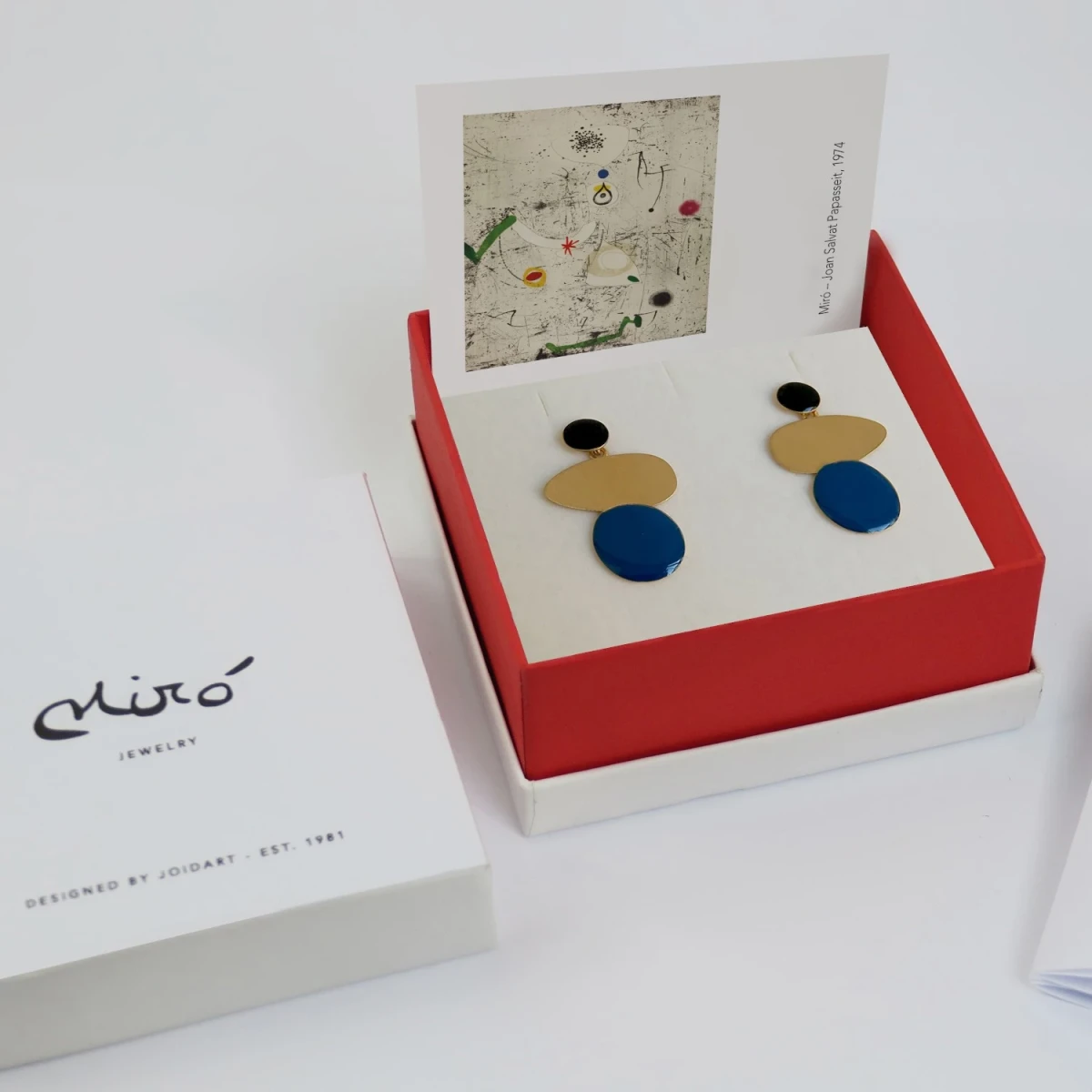 Złote kolczyki potrójne