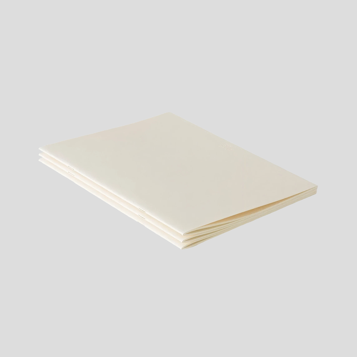 Zestaw trzech gładki notatników Light A4 Blank