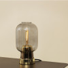 Lampa stołowa AMP Brass smoke-brass to wyjątkowe połączenie materiałów i odcieni - Normann Copenhagen