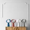 Lampy stołowe Eclipse Miniforms w czterech kolorach - aranżacja na drewnianej komodzie